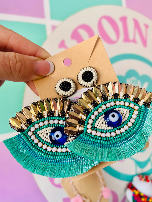 ARETES OJITOS TURQUESAS
